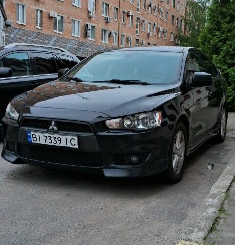 Чорний Міцубісі Lancer, об'ємом двигуна 2 л та пробігом 272 тис. км за 7800 $, фото 1 на Automoto.ua