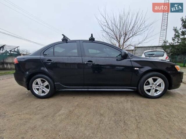 Чорний Міцубісі Lancer, об'ємом двигуна 2 л та пробігом 300 тис. км за 6000 $, фото 1 на Automoto.ua