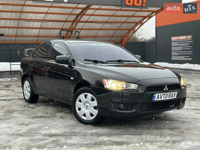 Чорний Міцубісі Lancer, об'ємом двигуна 1.5 л та пробігом 197 тис. км за 5700 $, фото 1 на Automoto.ua