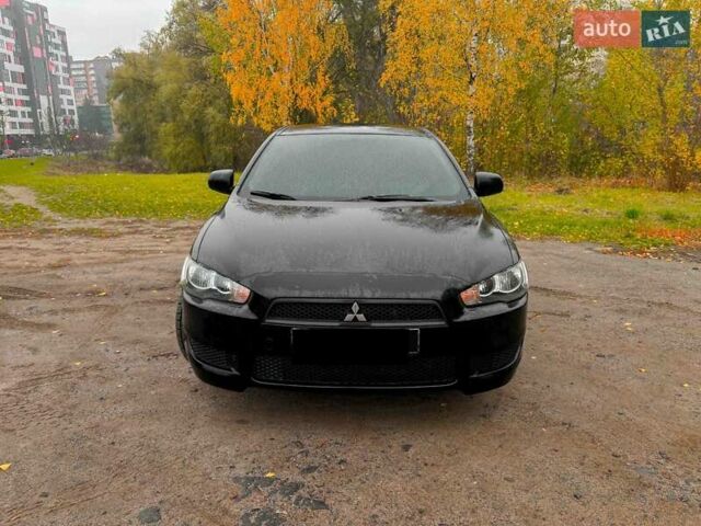 Черный Мицубиси Лансер, объемом двигателя 1.5 л и пробегом 201 тыс. км за 6502 $, фото 1 на Automoto.ua