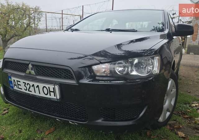 Черный Мицубиси Лансер, объемом двигателя 1.5 л и пробегом 190 тыс. км за 5200 $, фото 1 на Automoto.ua