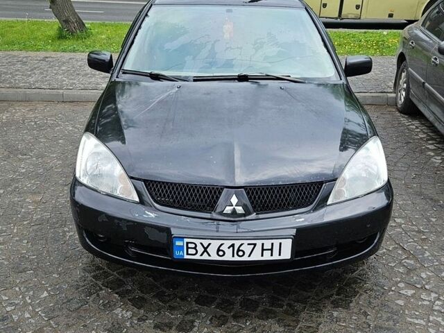 Чорний Міцубісі Lancer, об'ємом двигуна 1.6 л та пробігом 343 тис. км за 3500 $, фото 1 на Automoto.ua