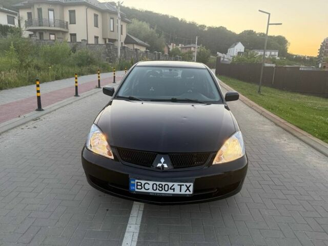 Чорний Міцубісі Lancer, об'ємом двигуна 1.6 л та пробігом 151 тис. км за 4700 $, фото 1 на Automoto.ua