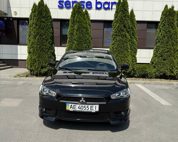 Чорний Міцубісі Lancer, об'ємом двигуна 2 л та пробігом 217 тис. км за 7800 $, фото 1 на Automoto.ua