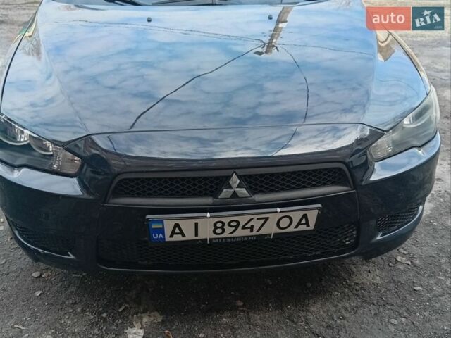 Черный Мицубиси Лансер, объемом двигателя 1.5 л и пробегом 229 тыс. км за 5000 $, фото 1 на Automoto.ua