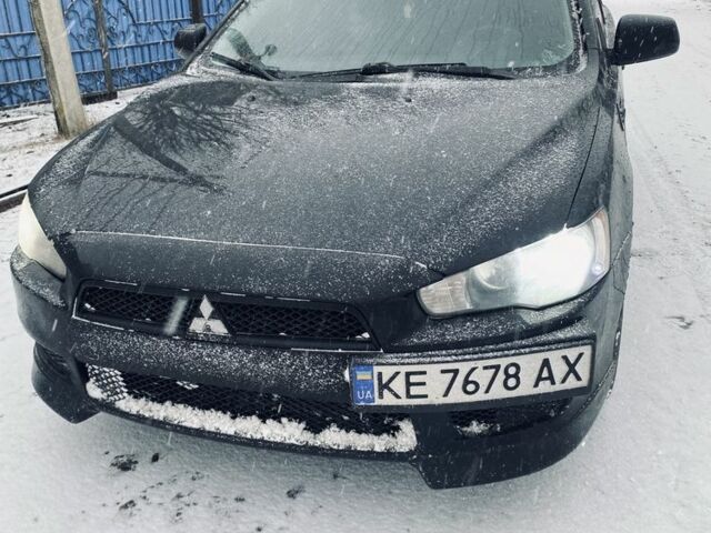 Черный Мицубиси Лансер, объемом двигателя 1.5 л и пробегом 220 тыс. км за 6019 $, фото 1 на Automoto.ua
