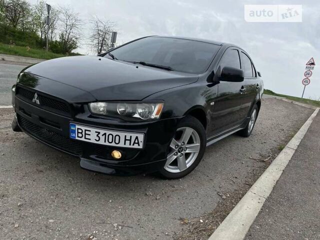 Чорний Міцубісі Lancer, об'ємом двигуна 2 л та пробігом 200 тис. км за 7600 $, фото 1 на Automoto.ua