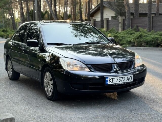 Чорний Міцубісі Lancer, об'ємом двигуна 1.6 л та пробігом 300 тис. км за 4600 $, фото 1 на Automoto.ua