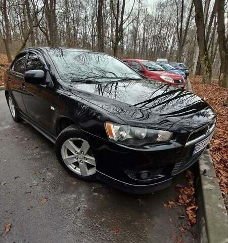 Чорний Міцубісі Lancer, об'ємом двигуна 2 л та пробігом 302 тис. км за 7200 $, фото 1 на Automoto.ua