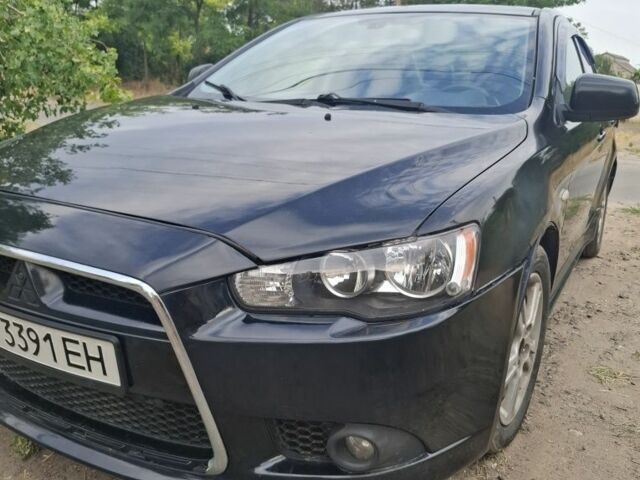 Чорний Міцубісі Lancer, об'ємом двигуна 2 л та пробігом 281 тис. км за 5512 $, фото 1 на Automoto.ua