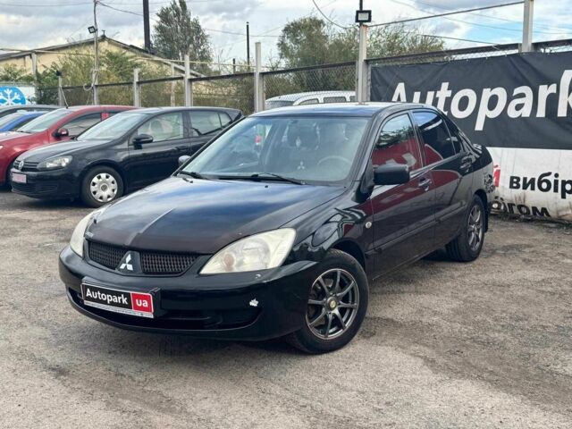 Мицубиси Лансер 2008 в Запорожье на Automoto.ua Черный Мицубиси Лансер, объемом двигателя 1.6 л и пробегом 316 тыс. км за 4290 $, фото 1 на Automoto.ua