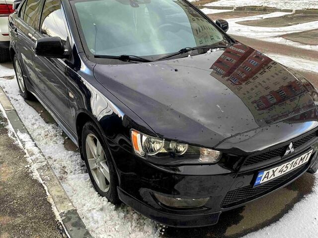 Черный Мицубиси Лансер, объемом двигателя 2 л и пробегом 1570 тыс. км за 6800 $, фото 1 на Automoto.ua