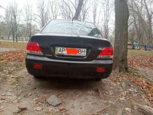 Черный Мицубиси Лансер, объемом двигателя 6 л и пробегом 190 тыс. км за 4500 $, фото 1 на Automoto.ua