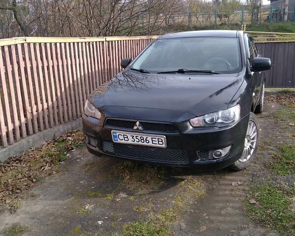 Черный Мицубиси Лансер, объемом двигателя 1.5 л и пробегом 219 тыс. км за 6000 $, фото 1 на Automoto.ua