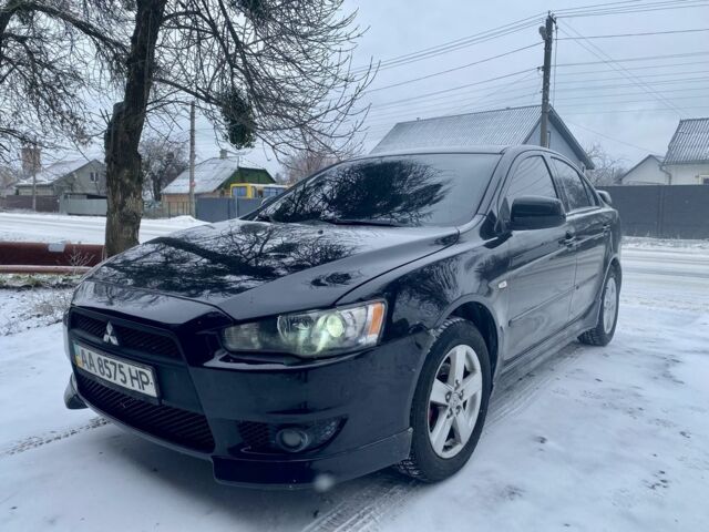 Чорний Міцубісі Lancer, об'ємом двигуна 2 л та пробігом 180 тис. км за 6999 $, фото 1 на Automoto.ua