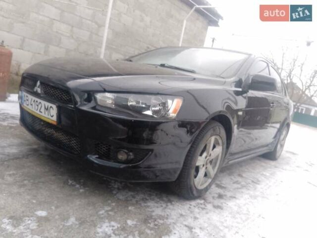 Черный Мицубиси Лансер, объемом двигателя 2 л и пробегом 225 тыс. км за 5400 $, фото 1 на Automoto.ua