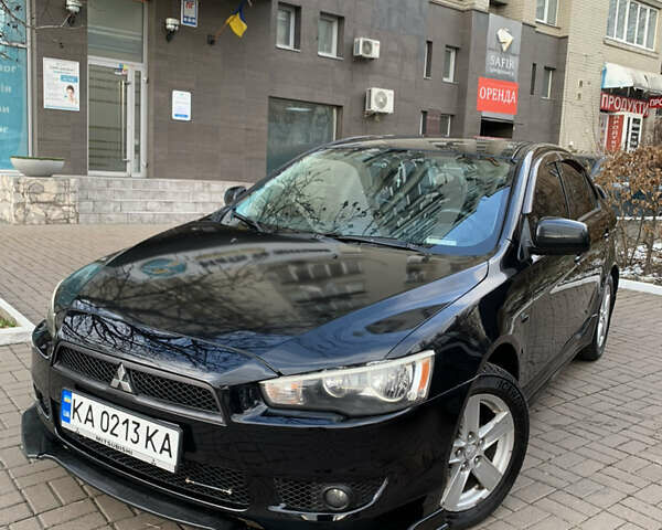 Чорний Міцубісі Lancer, об'ємом двигуна 2 л та пробігом 290 тис. км за 6500 $, фото 1 на Automoto.ua