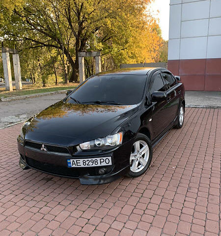 Чорний Міцубісі Lancer, об'ємом двигуна 2 л та пробігом 190 тис. км за 7150 $, фото 1 на Automoto.ua