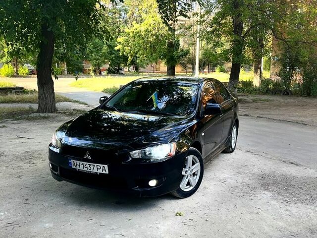 Чорний Міцубісі Lancer, об'ємом двигуна 2 л та пробігом 220 тис. км за 6300 $, фото 1 на Automoto.ua