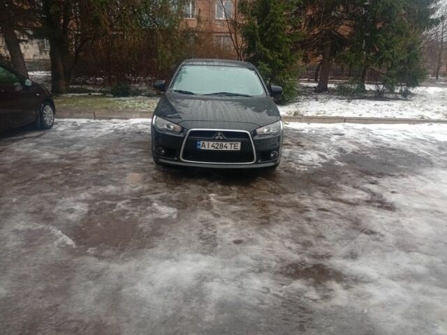 Черный Мицубиси Лансер, объемом двигателя 1.5 л и пробегом 240 тыс. км за 4597 $, фото 1 на Automoto.ua