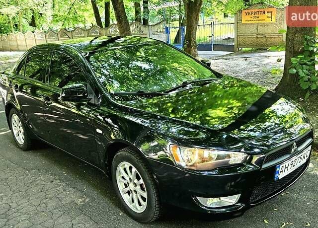 Черный Мицубиси Лансер, объемом двигателя 1.5 л и пробегом 205 тыс. км за 6300 $, фото 1 на Automoto.ua
