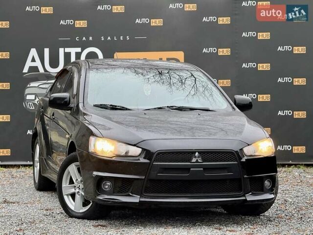 Чорний Міцубісі Lancer, об'ємом двигуна 2 л та пробігом 118 тис. км за 6200 $, фото 1 на Automoto.ua