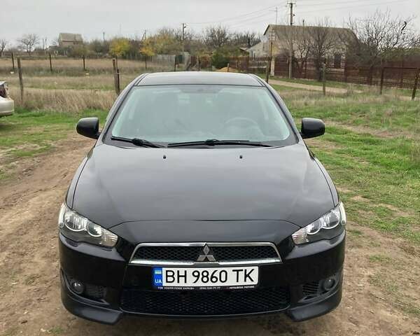 Чорний Міцубісі Lancer, об'ємом двигуна 2 л та пробігом 180 тис. км за 7500 $, фото 1 на Automoto.ua
