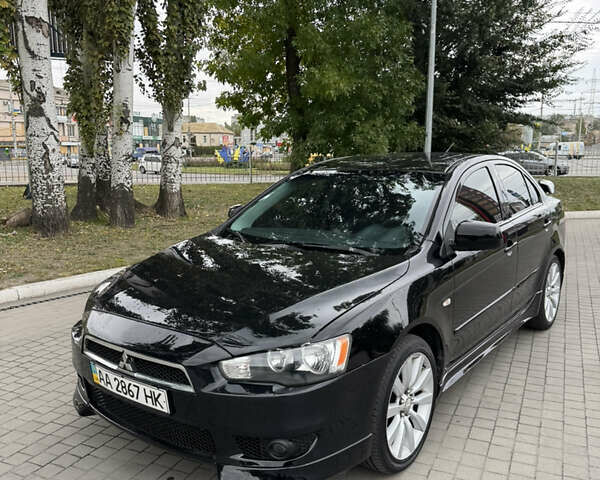 Чорний Міцубісі Lancer, об'ємом двигуна 2 л та пробігом 200 тис. км за 6800 $, фото 1 на Automoto.ua