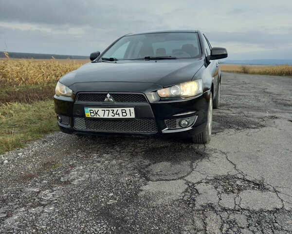 Чорний Міцубісі Lancer, об'ємом двигуна 1.5 л та пробігом 160 тис. км за 5850 $, фото 1 на Automoto.ua