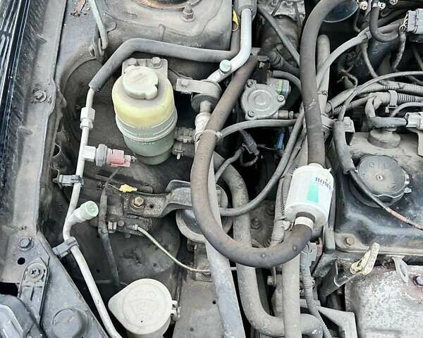 Чорний Міцубісі Lancer, об'ємом двигуна 1.6 л та пробігом 300 тис. км за 5500 $, фото 1 на Automoto.ua