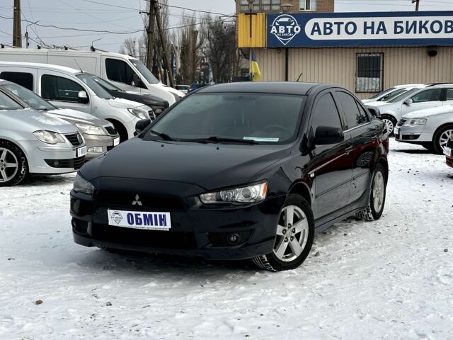 Чорний Міцубісі Lancer, об'ємом двигуна 2 л та пробігом 239 тис. км за 6900 $, фото 1 на Automoto.ua