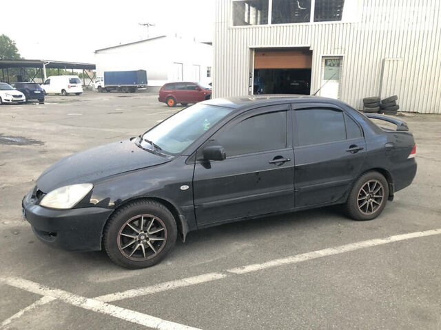 Чорний Міцубісі Lancer, об'ємом двигуна 1.6 л та пробігом 172 тис. км за 3500 $, фото 1 на Automoto.ua