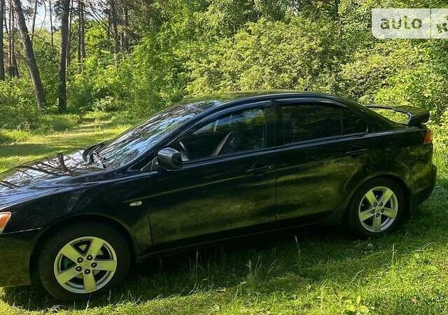 Чорний Міцубісі Lancer, об'ємом двигуна 1.5 л та пробігом 187 тис. км за 6100 $, фото 1 на Automoto.ua