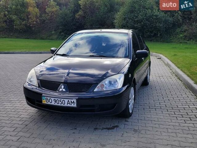 Міцубісі Lancer 2008 у Тернополі на Automoto.ua Чорний Міцубісі Lancer, об'ємом двигуна 1.58 л та пробігом 182 тис. км за 5600 $, фото 1 на Automoto.ua
