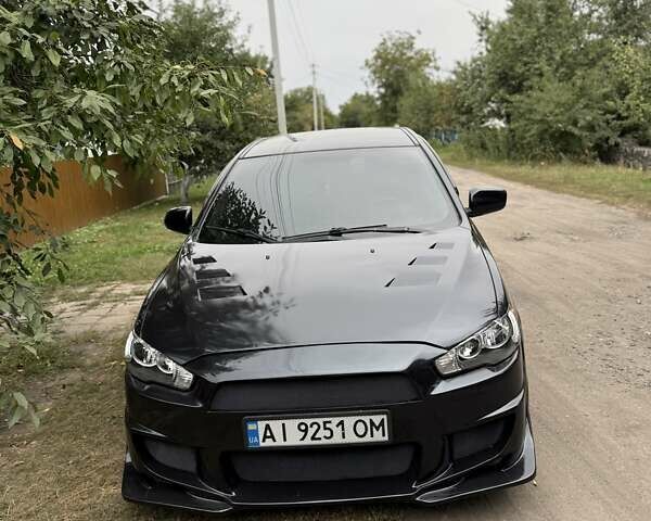 Чорний Міцубісі Lancer, об'ємом двигуна 1.5 л та пробігом 270 тис. км за 8000 $, фото 1 на Automoto.ua