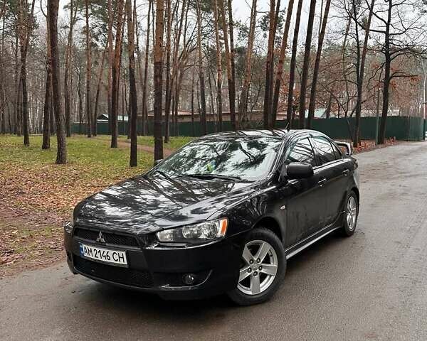 Чорний Міцубісі Lancer, об'ємом двигуна 2 л та пробігом 263 тис. км за 5750 $, фото 1 на Automoto.ua