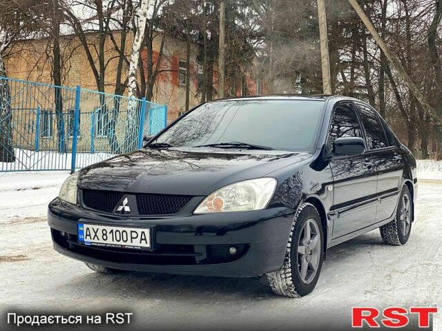 Чорний Міцубісі Lancer, об'ємом двигуна 1.6 л та пробігом 22000 тис. км за 5500 $, фото 1 на Automoto.ua