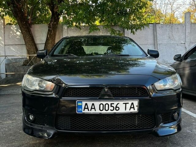 Чорний Міцубісі Lancer, об'ємом двигуна 2 л та пробігом 256 тис. км за 5000 $, фото 1 на Automoto.ua