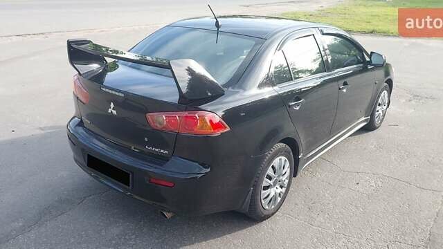 Чорний Міцубісі Lancer, об'ємом двигуна 1.5 л та пробігом 207 тис. км за 5800 $, фото 1 на Automoto.ua