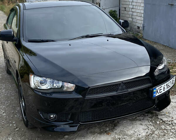 Черный Мицубиси Лансер, объемом двигателя 2 л и пробегом 275 тыс. км за 7600 $, фото 1 на Automoto.ua