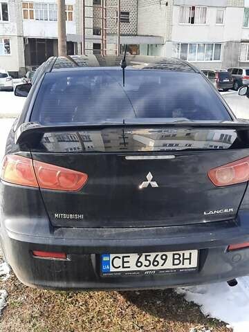 Чорний Міцубісі Lancer, об'ємом двигуна 2 л та пробігом 228 тис. км за 5500 $, фото 1 на Automoto.ua