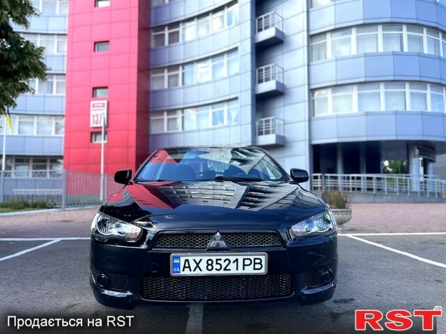 Чорний Міцубісі Lancer, об'ємом двигуна 2 л та пробігом 220 тис. км за 5700 $, фото 1 на Automoto.ua