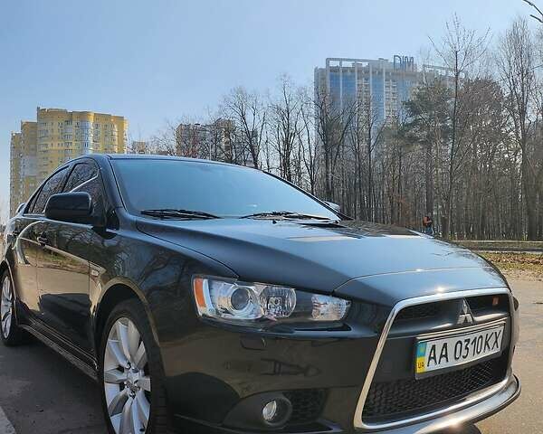 Чорний Міцубісі Lancer, об'ємом двигуна 2 л та пробігом 150 тис. км за 10500 $, фото 1 на Automoto.ua