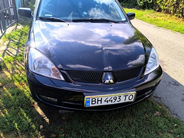 Чорний Міцубісі Lancer, об'ємом двигуна 1.6 л та пробігом 232 тис. км за 4400 $, фото 1 на Automoto.ua