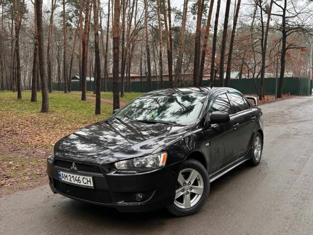 Черный Мицубиси Лансер, объемом двигателя 2 л и пробегом 263 тыс. км за 5300 $, фото 1 на Automoto.ua