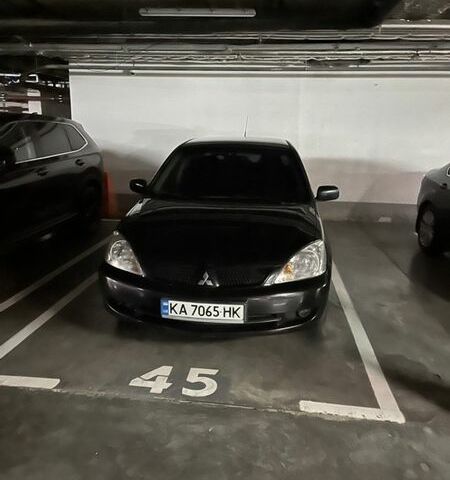 Черный Мицубиси Лансер, объемом двигателя 1.6 л и пробегом 380 тыс. км за 4400 $, фото 1 на Automoto.ua