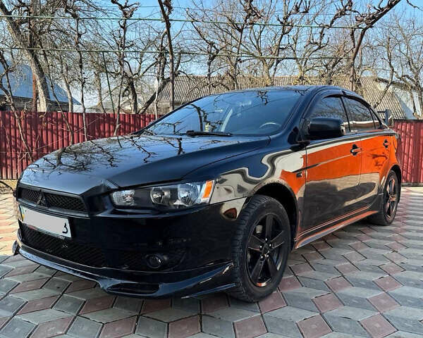 Чорний Міцубісі Lancer, об'ємом двигуна 2 л та пробігом 150 тис. км за 6500 $, фото 1 на Automoto.ua