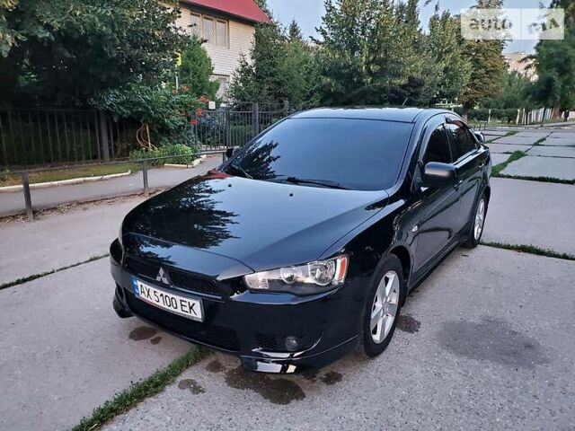 Чорний Міцубісі Lancer, об'ємом двигуна 2 л та пробігом 185 тис. км за 7800 $, фото 1 на Automoto.ua