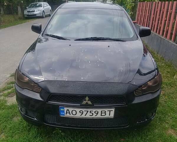 Чорний Міцубісі Lancer, об'ємом двигуна 2 л та пробігом 183 тис. км за 5000 $, фото 1 на Automoto.ua