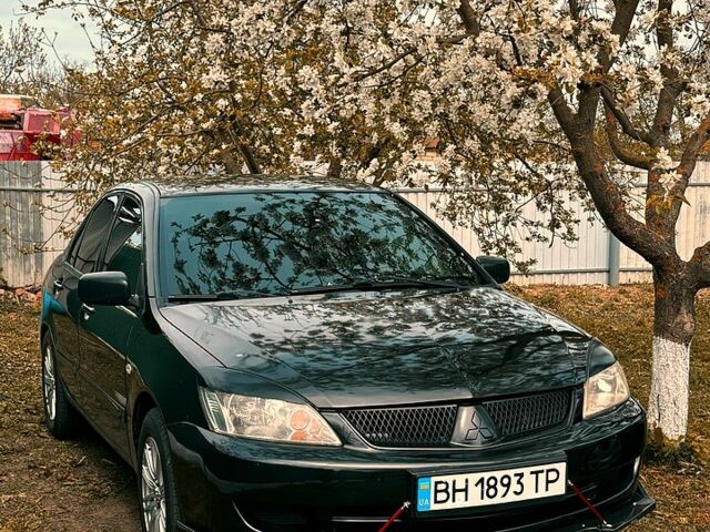 Чорний Міцубісі Lancer, об'ємом двигуна 1.6 л та пробігом 200 тис. км за 4550 $, фото 1 на Automoto.ua
